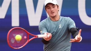 Notícias ao Minuto Brasil - Esporte - João Fonseca garante cabeça de chave em Madri após desistência de Djokovic